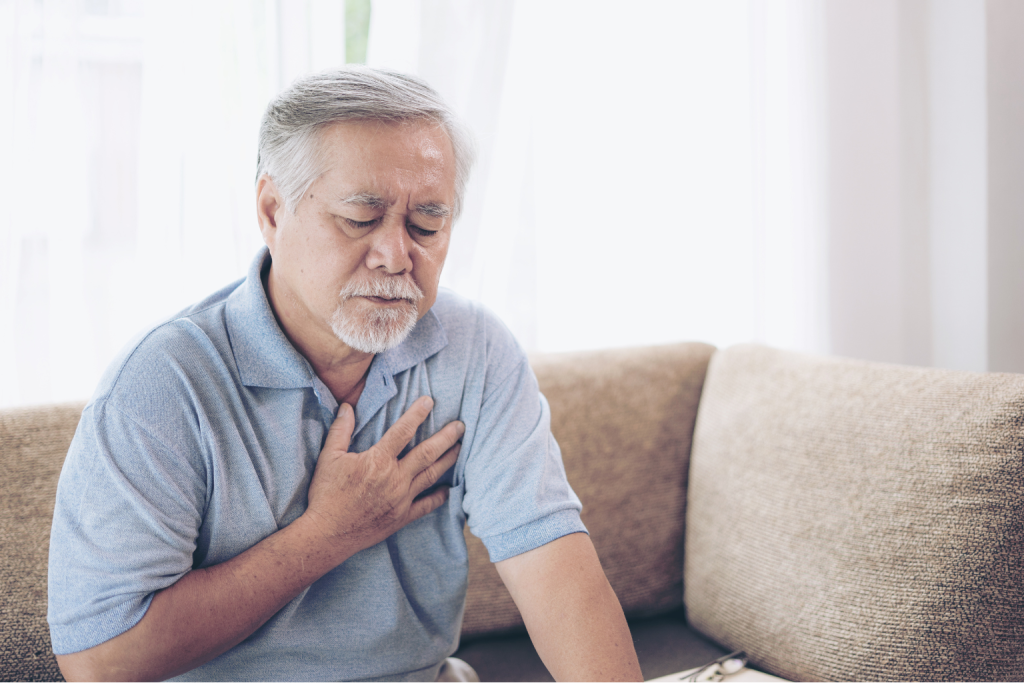Older man feeling chest pain